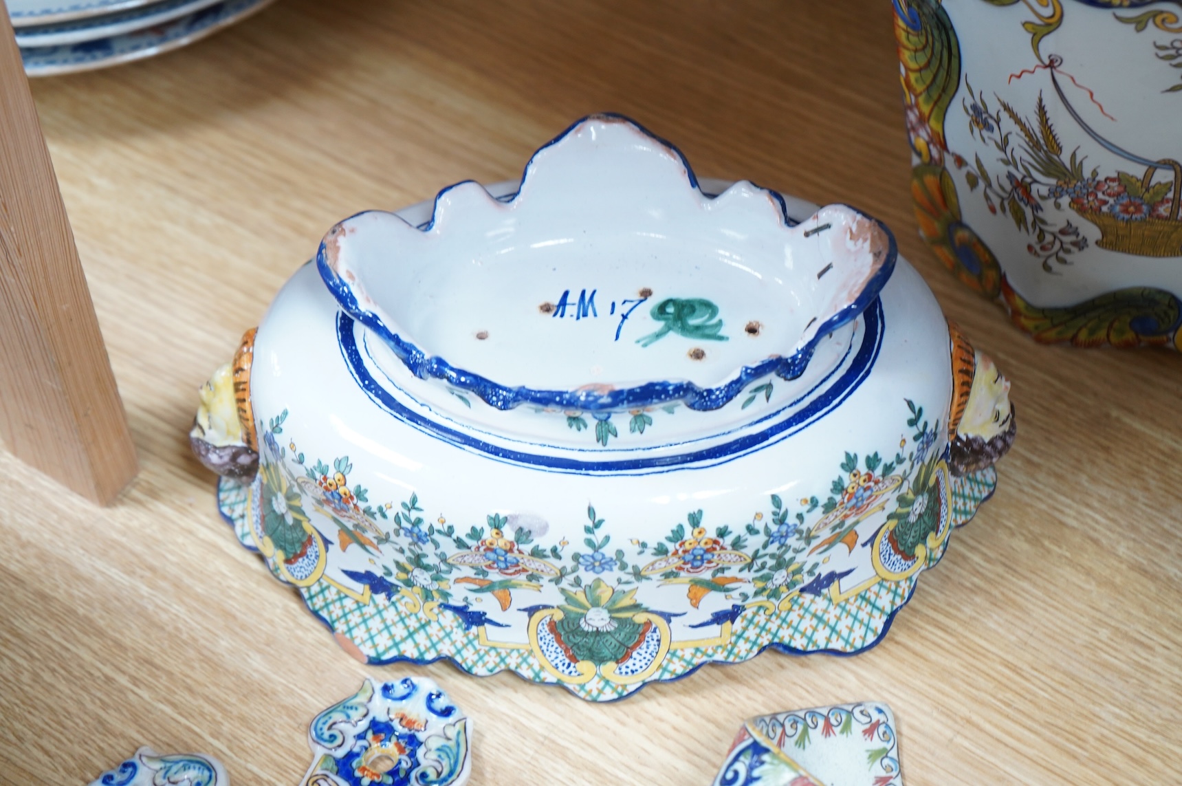 19th century French decorative faience including bag pipes, a large wall pocket, jardiniere etc (22).